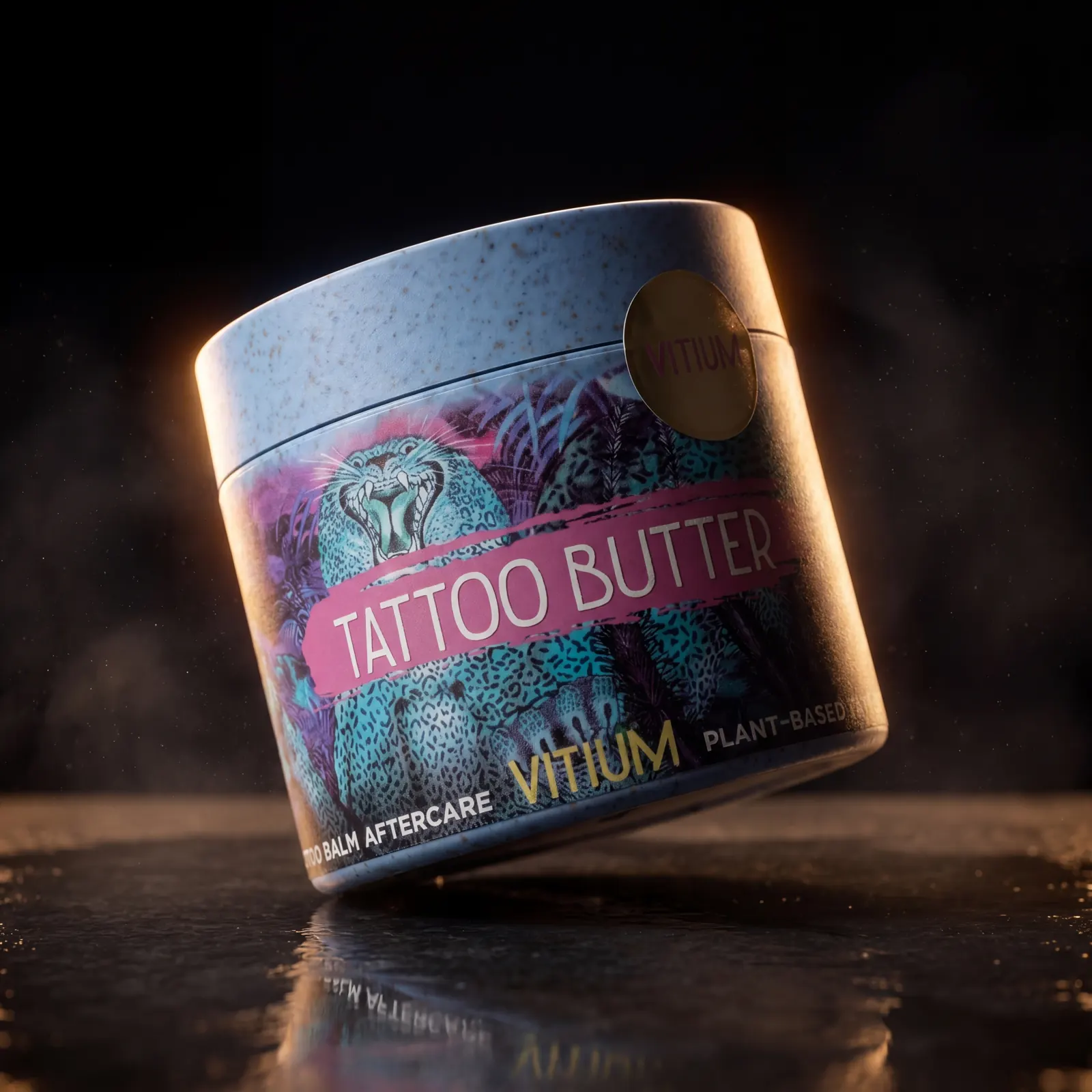VITIUM Tattoo Butter — sugarcane-derived jar with signature tiger illustration, lit by warm amber glow in a moody editorial setting